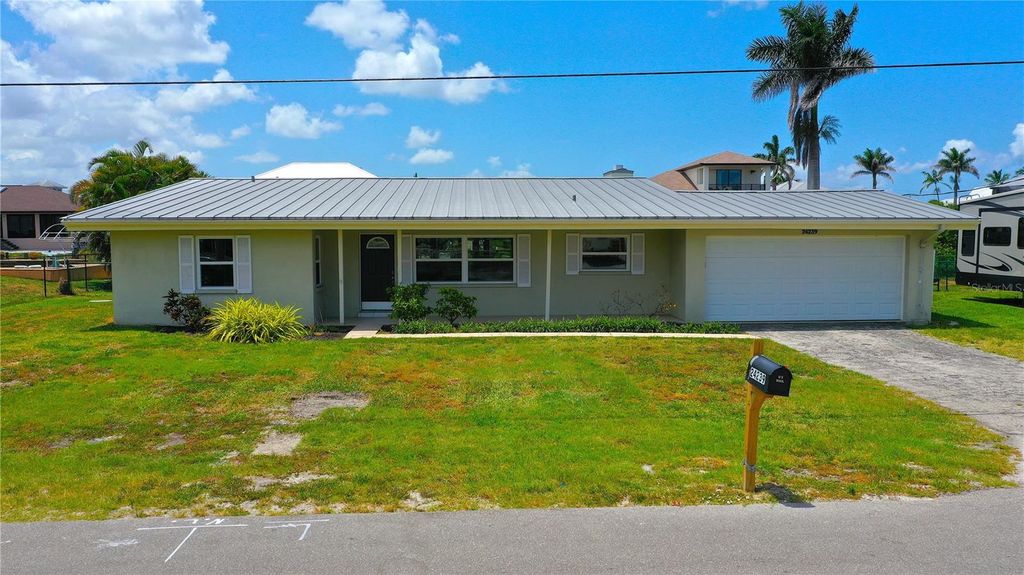 Photo of 24239 Yacht Club Boulevard, Punta Gorda, FL 33955 (MLS # C7510656)