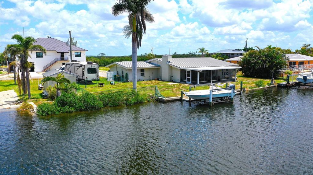 Photo of 24239 Yacht Club Boulevard, Punta Gorda, FL 33955 (MLS # C7510656)