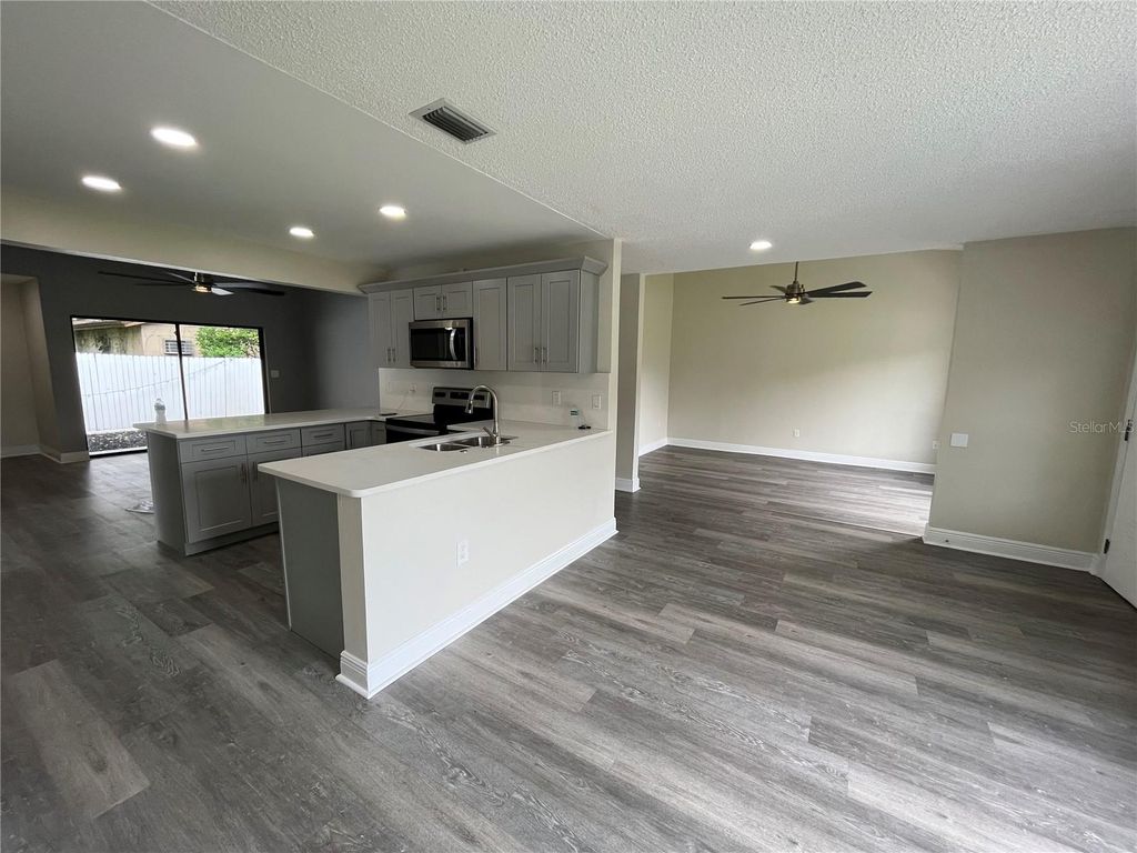 Photo of 2606 Sheffield Ave, Orlando, FL 32806 (MLS # O6378982)