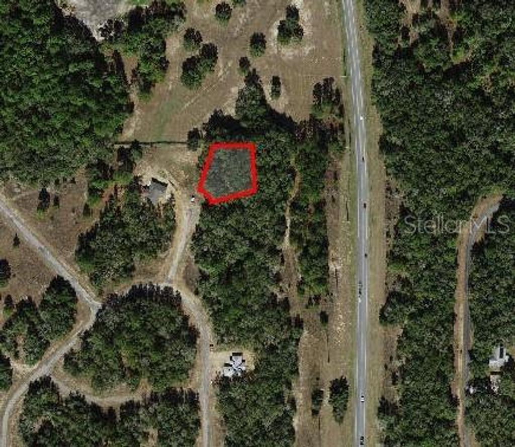 Photo of 11231 N Denice Point, Dunnellon, FL 34434 (MLS # C7515569)