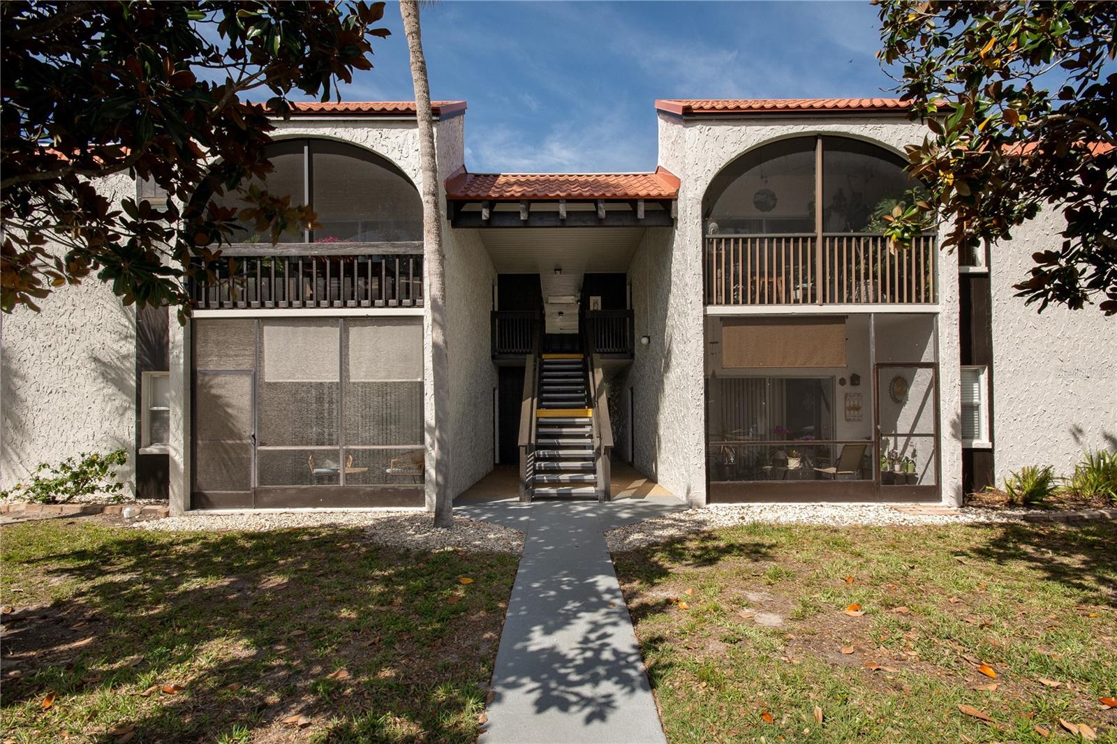 Experience a convenient lifestyle in a meticulously maintained community featuring reasonable condo fees and an abundance of amenities. With two heated community pools, two tennis courts, recreational facilities, barbecue and picnic areas, and a clubhouse, living here is both practical and enjoyable. Located within walking distance of Publix, this unit offers an excellent opportunity for those seeking additional income or cost-effective living in the heart of Sarasota. Inside, discover an inviting open floor plan with porcelain tile and carpeted floors, complemented by stainless steel appliances in the kitchen. Relax on the covered lanai, perfect for enjoying the refreshing Florida breeze. The spacious bedroom includes a walk-in closet with ample storage. Additional amenities include a dedicated storage unit conveniently located right outside your front door and on-site laundry facilities. Beyond the community, enjoy easy access to the pristine shores of Siesta Key Beach and vibrant downtown Sarasota. Whether it's a leisurely bike ride to the beach or exploring the charm of Siesta Key Village, this location offers endless opportunities for dining, shopping, and recreational activities.
