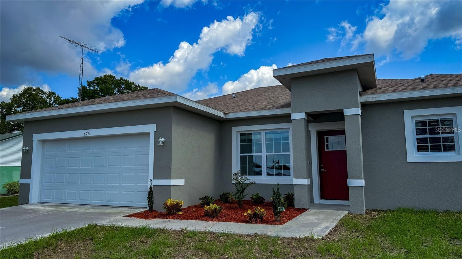 BRAND NEW 2025 HOME on a BIG LOT in Ocala! Featuring 4 bedrooms and 2.5 baths, this home combines modern style with everyday comfort. The SELLER IS OFFERING CREDIT toward closing costs or interest rate buy-downs, making it an even better deal. Valuable upgrades include a SMART KEY SYSTEM for added security and a WASHER AND DRYER for move-in convenience. The open-concept layout offers plenty of space for entertaining, while the fully equipped kitchen features STAINLESS STEEL APPLIANCES, including a refrigerator, range, dishwasher, microwave, and disposal. The master bathroom is a true retreat with a gorgeous STANDALONE TUB and sleek SHOWER DOOR. High-end finishes like TOP-OF-THE-LINE BASEBOARDS and STAINLESS STEEL HANDLES add a polished touch throughout the home. Enjoy relaxing in your spacious backyard or under the shaded BACK PATIO, perfect for creating your dream barbecue space. Ideally CENTERED between everything you need—15 minutes from restaurants, Walmart, Publix, and more, and just minutes from SUMMERGLEN GOLF CLUB, STONE CREEK GOLF CLUB, TOP-RATED TRAILS, and the WORLD EQUESTRIAN CENTER. Live close to DISNEY PARKS and DAYTONA BEACH, while still enjoying a peaceful lifestyle away from the hustle and bustle. Best of all, this home HAS NO HOA. Schedule your tour today—(Photos are of model home).