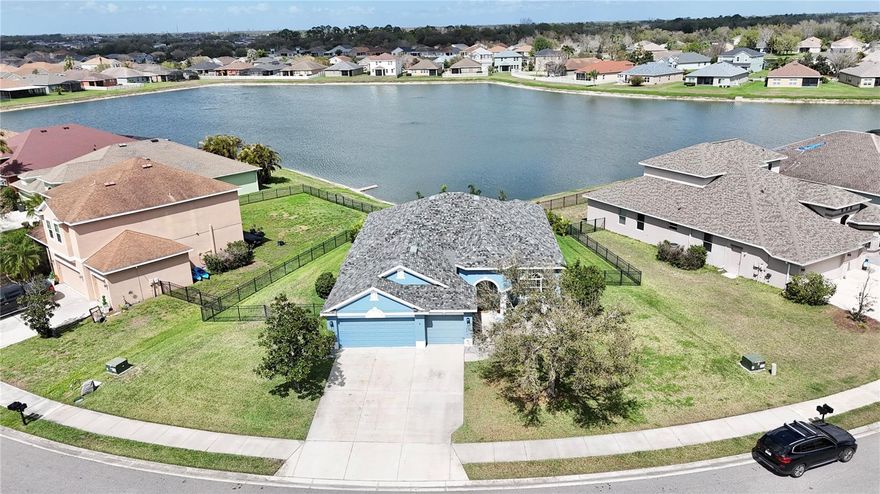 Exceptional opportunity to own a beautifully updated 4 bedroom, 3 bathroom, 3 car garage home on one of the largest homesites in the gated Copperstone community in Parrish. Situated on just over 1/4 acre, this property offers a fully fenced backyard with a wide panoramic pond view creating a peaceful setting with plenty of space to relax or entertain.

From the moment you arrive, the home offers strong curb appeal with a brand new roof, fresh exterior paint, and new landscaping. Inside, the home is light and bright with an open concept layout, soaring 9.5 foot ceilings, and a desirable triple split floor plan providing both functionality and privacy.

The kitchen is designed for everyday living and entertaining featuring upgraded 42 inch cabinetry with trim molding, new quartz countertops, brand new stainless steel appliances, updated fixtures, and generous workspace. The kitchen flows seamlessly into the main living areas and overlooks the backyard and pond views.

Recent improvements throughout the home include new luxury vinyl plank flooring with no carpet in any of the bedrooms, fresh interior paint, updated lighting, modern hardware, and new fixtures creating a clean and updated feel.

The oversized homesite provides one of the largest yards in the community and includes a full irrigation system and fully fenced backyard with expansive pond views and plenty of space for outdoor living.

Copperstone is a gated community offering a variety of amenities including a heated resort style swimming pool, clubhouse, fitness center, basketball court, playground, dog park, billiards room, and scenic ponds throughout the neighborhood. The community also offers a designated parking area for commercial vehicles which is a rare benefit for homeowners with work trucks or company vehicles.

The location is highly convenient with Barbara A. Harvey Elementary School, Parrish Community High School, and the new State College of Florida campus located nearby. Residents enjoy quick access to Erie Road and Moccasin Wallow Road with convenient connections to I-75, Lakewood Ranch, Sarasota, St. Petersburg, and Tampa.

Parrish continues to be one of the fastest growing areas in Manatee County known for its larger homesites, expanding schools, new infrastructure, and close proximity to shopping, dining, and Gulf Coast beaches.

This property combines space, updates, water views, and gated community living in one of Parrish’s most sought after neighborhoods.