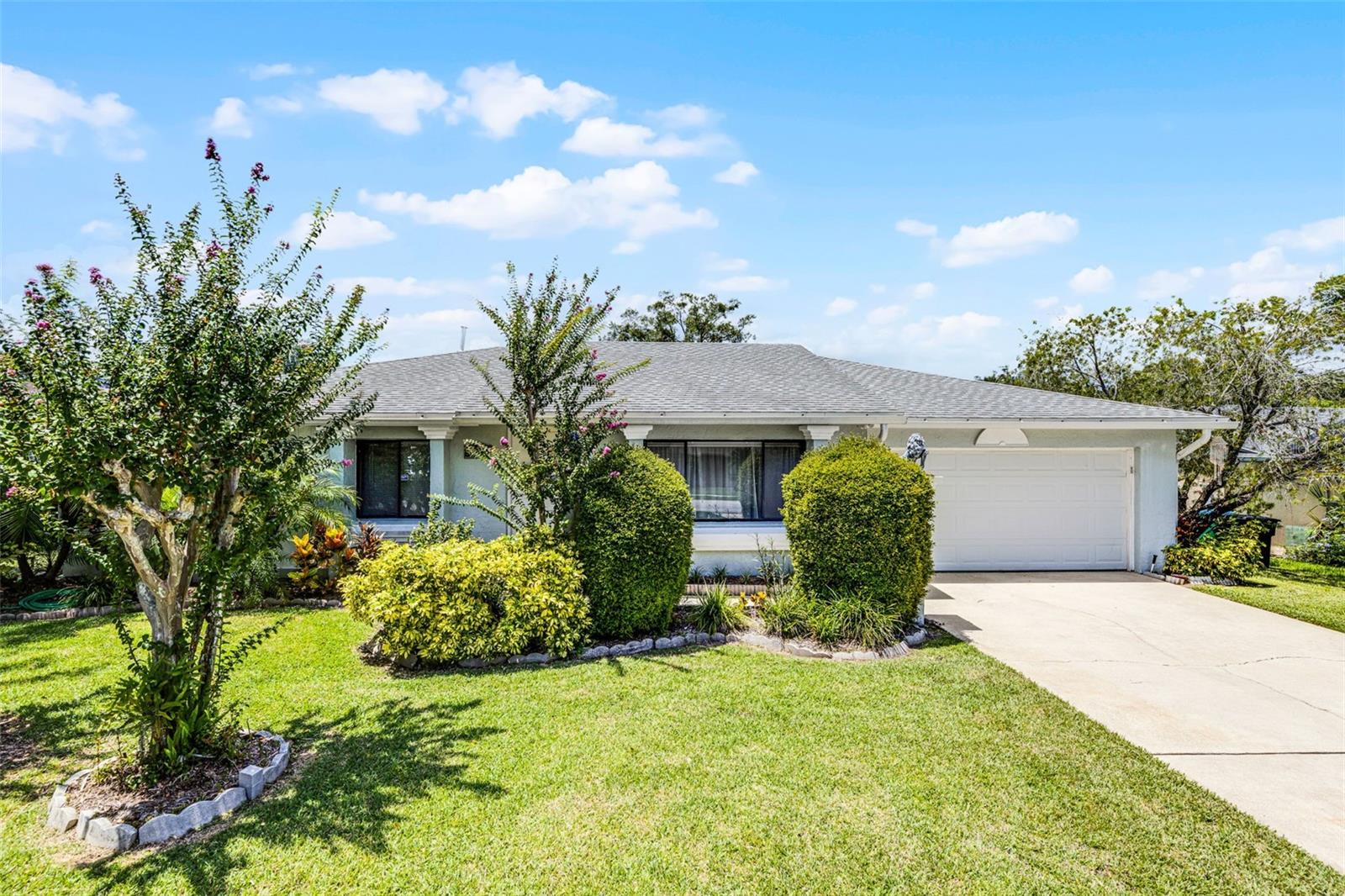 Are you ready to live the Florida lifestyle? Located in one of Florida's most desired areas, this Longwood home is ready for its next owner, and no better time than in the beginning of a new school year. Meticulously cared for by the current homeowner for the past 13 years, there is no detail that was overlooked. Perfectly positioned in a dead-end cul-de-sac with only a few other homes, 527 Eastport Drive has a lot to offer, and would make the ideal first home for someone. Once across the threshold, you can start to appreciate all of the small details and space that this home has to offer, beginning with a formal living room on the right hand side, adjacent family room with direct access outside, and even a space for a formal dining room table; all with an abundance of natural light beaming in from every corner. The kitchen has been well-updated to include granite countertops, and a newer stove and dishwasher which have been barely used. Do you like to entertain and host family get-togethers and holiday parties, well you'll be the envy of your circle with this Florida room! Accessible from the kitchen and from the family room, this colossal sized covered lanai is a true extension of your inside living space, and sets the scene to enjoy your backyard and countless fruit trees. Enjoy your morning cappuccino or evening cabernet in your covered lanai, and really begin to appreciate all that Florida has to offer. An inside laundry room is the convenient space for your full size washer and dryer, as well as laundry sink, and additional closets for storage. Two secondary bedrooms are located on the left side of the home, and are serviced by a full bathroom in between, with shower and bathroom combination, while your primary bedroom is located in the far right of the home for added privacy, with its own en-suite bathroom and large walk-in closet. NO HOA | NEARLY A 1/4 ACRE FENCED IN LOT | NOT ONE STICH OF CARPET | SEVERAL FRUIT TREES | SEMINOLE COUNTY SCHOOLS | NEW AIR HANDLER IN 2024 | NEW ROOF IN 2022 | Don't you deserve to walk into a home every day that you are excited about??