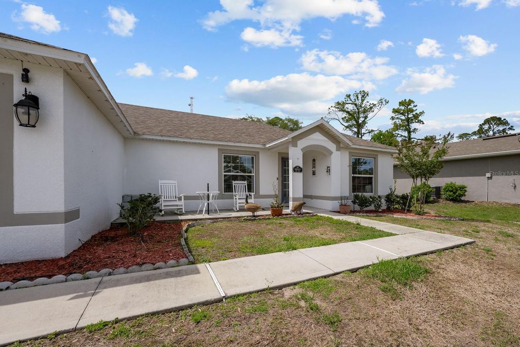 Photo of 45 Woodfield Drive, Palm Coast, FL 32164 (MLS # FC317306)