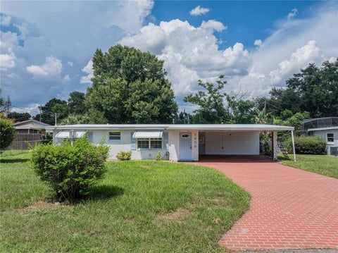 Photo of 2608 Trinity Circle NW, Winter Haven, FL 33881 (MLS # L4964239)
