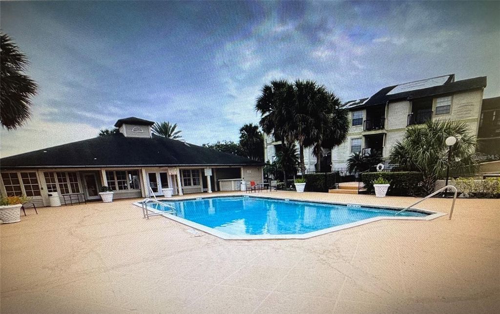 Photo of 1940 Lake Atriums Circle #90, Orlando, FL 32839 (MLS # O6377196)