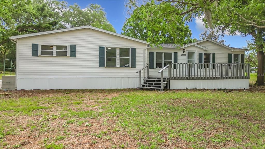 Photo of 8331 County Road 109, Lady Lake, FL 32159 (MLS # S5147176)