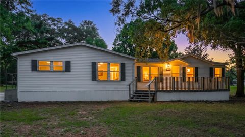 Photo of 8331 County Road 109, Lady Lake, FL 32159 (MLS # S5147176)
