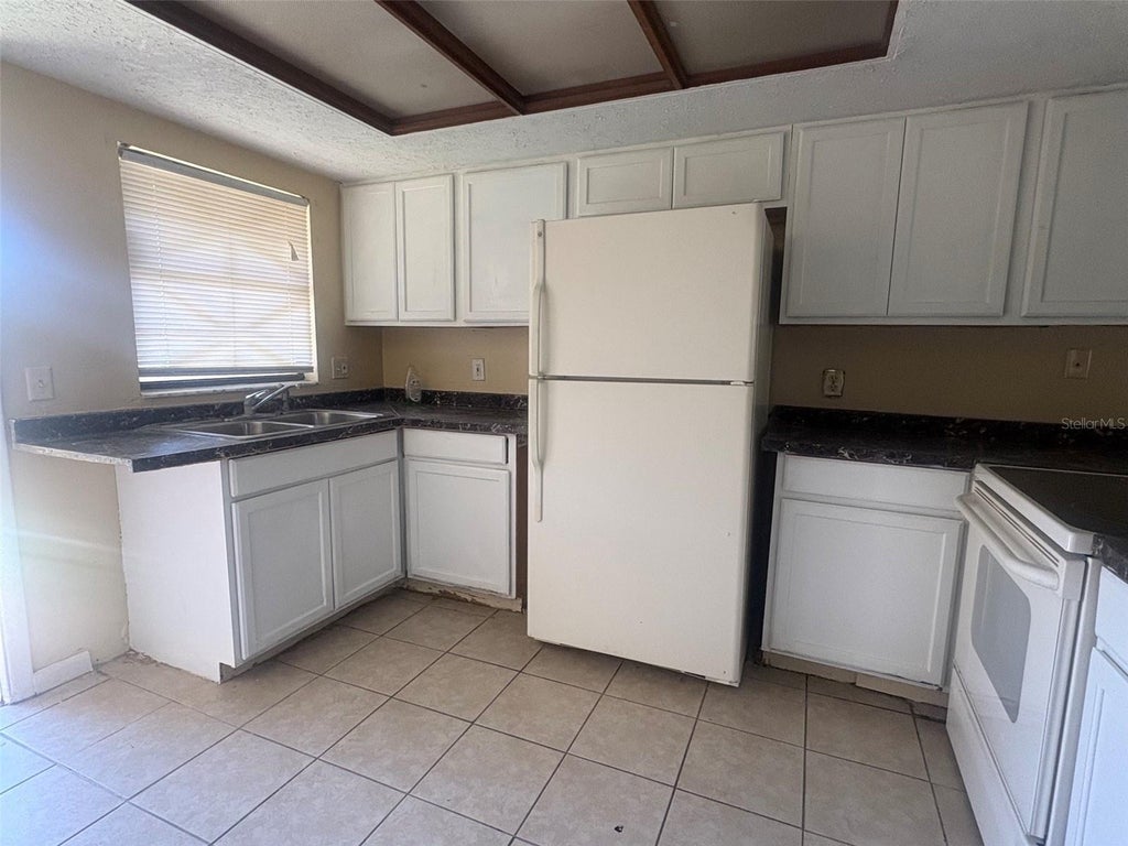 Photo of 12723 Lockey Lane, Tampa, FL 33612 (MLS # TB8557033)