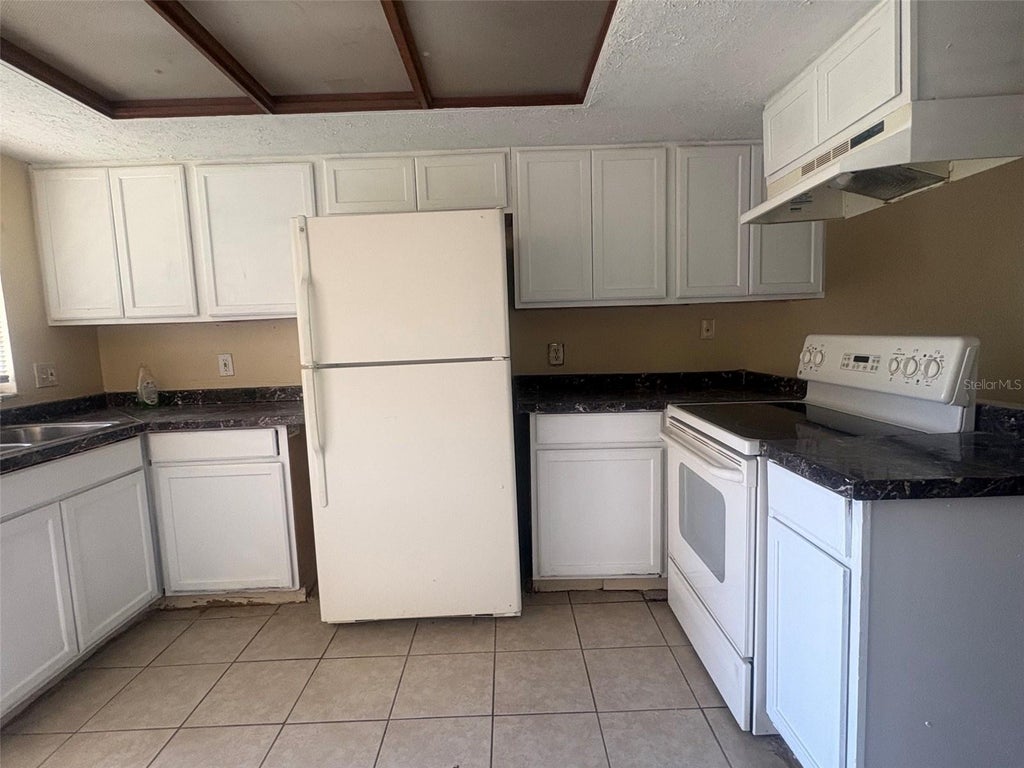 Photo of 12723 Lockey Lane, Tampa, FL 33612 (MLS # TB8557033)