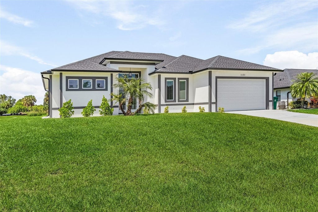 Photo of 1131 Hoffer Street, Port Charlotte, FL 33953 (MLS # N6145539)