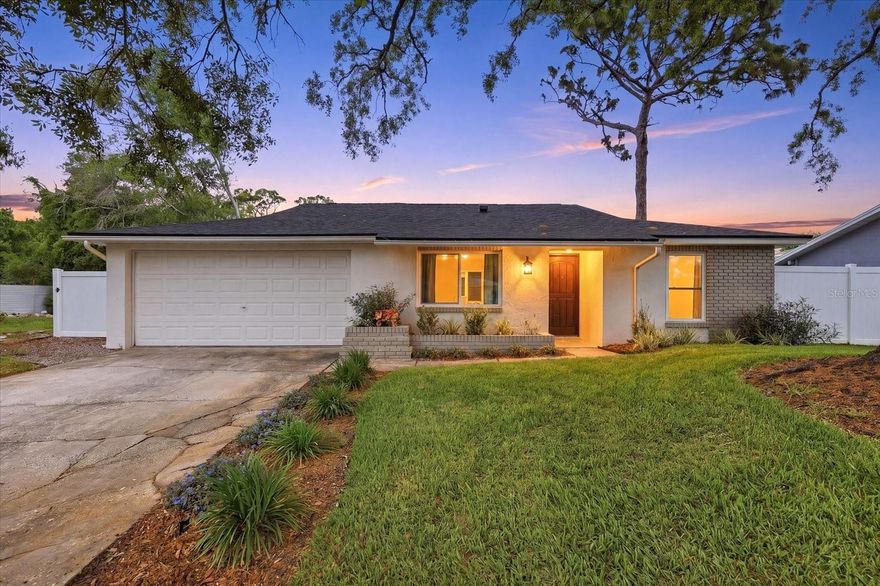 You'll love this beautifully renovated three bedroom, two bathroom block home, tucked away at the end of a quiet, pretty cul de sac in one of Largo's most charming and family friendly neighborhoods. Every inch of the home has been thoughtfully updated with elegant finishes and real care, because the home was remodeled with the intention to stay, not just to sell. That means quality craftsmanship throughout, not a quick flip.

One of the best features is the peace of mind this home offers. It sits on one of the highest elevations in Pinellas County, on a raised lot that removes any flooding worries entirely. Add to that the solid concrete block construction and brand new PGT hurricane impact windows, and you have exceptional storm protection, energy efficiency, and sound insulation. The windows come with a transferable ten year warranty, which helps lower insurance premiums, a real benefit for Florida homeowners.

Inside, luxury vinyl plank flooring flows through an open layout with vaulted ceilings and an exposed brick fireplace that anchors the living room. The stunning quartz Viola kitchen features stainless steel Samsung appliances, soft close cabinetry, elegant lighting, and a large kitchen island with seating for casual dining. The split floor plan offers a private master suite with a walk in closet and ensuite bath, while the second bath, finished with Delta brass fixtures and a dual vanity, sits between the two additional bedrooms. A separate formal dining area provides space for larger gatherings or holiday meals.

The updates go well beyond what you can see. A brand new Owen Corning shingle roof was installed in 2025 with a transferable twenty five year warranty. The entire electrical system has been upgraded, including a new panel, wiring, outlets, and switches. There's a new water heater, and all plumbing fixtures and valves have been replaced. The central HVAC system was replaced in 2018 and recently enhanced with all new ductwork and insulation. Outside, you'll find brand new landscaping with fresh sod, a new irrigation system and well pump on relay, and a brand new vinyl fenced yard, perfect for pets, family, or outdoor entertaining. The two car garage provides ample storage and parking.

And the location is just as impressive. You're close to the beach, near Clearwater, about a thirty minute drive to both Tampa International Airport, Clearwater St. Pete Airport, and vibrant downtown St. Pete. This home truly offers the perfect balance of design, efficiency, security, and convenience. It's hurricane ready, move in ready, and waiting for you to see it in person.