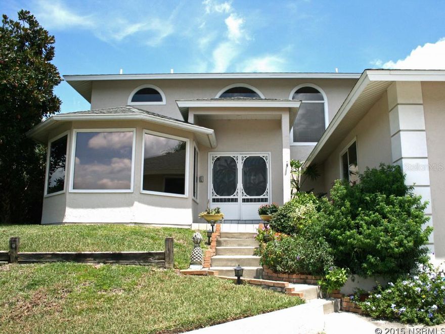 Beautiful North Beach Home In Prestigious Inlet Villas. Enjoy Water Views From Upstairs Balconies . Open Floor Plan , Vaulted Ceilings, FirePlace, Family Room, 2 Master Suites, Granite Kitchen. Enjoy The Amenities Of Minorca. Club House, Heated Pool, Spa, Tennis, Fitness Center. ;Water: City