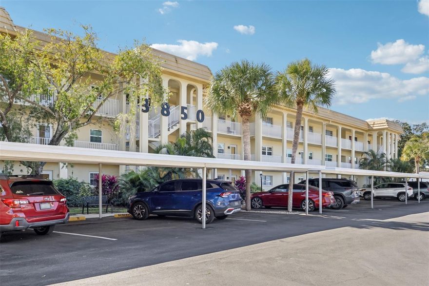 Immerse yourself in the perfect blend of sophisticated design and serene lakefront living in this expansive 2 bedroom, 2 bathroom second floor sanctuary. Rarely does a condo of this size, and with these views, become available at an affordable price in a well managed building just minutes from the heart of St Pete.  Step into the bright, airy, open concept floor plan designed for those who love space. The well appointed kitchen is gorgeous, featuring sleek quartz countertops and a massive center island that serves as the social hub of the home. Whether you’re prepping a meal or hosting friends, the seamless flow into the dining and living areas ensures you never lose sight of the unparalleled lake views framed by wall to wall windows.  In addition to the two spacious bedrooms, this layout also includes a den, perfect for a quiet home office or a cozy reading nook. The master suite has space for a king sized bed and offers a generous walk in closet and a private ensuite bath. The second bathroom is equally well appointed, featuring a tub shower combo to complement the master's walk in shower.  Chalet On The Lake is a well managed, all ages community located on a lakefront with a beautiful pool, just 10 minutes to the vibrant downtown of St Pete.   Come and make this your home too, call for your private showing today!