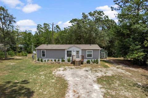 Photo of 2063 S Sunwood Point, Homosassa, FL 34448 (MLS # W7885667)