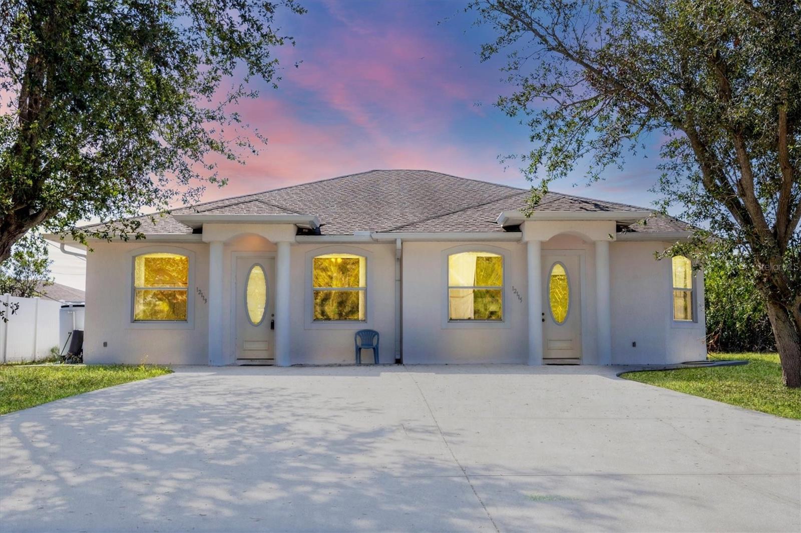 MINUTES AWAY WARM MINERAL SPRINGS AND NEW BUILD WELLEN PARK!NO HOA OR NO CDD!MINUTES AWAY FROM WARM MINERAL SPRIINGS AND WELLEN PARK! This gem offers 1,150 sq ft of luxurious living space on each side, with two spacious 2-bedroom, 2-bathroom units—perfect for comfortable, modern living. From the moment you step inside, you’ll be captivated by the soaring 10-foot ceilings that create an expansive, open feel throughout. Every corner of this home exudes charm and quality, with stylish finishes and an intelligently laid-out floor plan that maximizes space and functionality. Imagine enjoying morning coffee in the bright, airy living room or entertaining in the generous dining and kitchen areas. Whether you're looking to invest in a duplex with incredible rental potential or seeking a cozy, elegant home with extra income potential, this property is a perfect match. Located in a peaceful, family-friendly neighborhood, you'll have easy access to schools, shopping, and beautiful parks—all while enjoying the quiet beauty of North Port. This is more than just a home—it's an opportunity to live the Florida lifestyle you've been dreaming of!