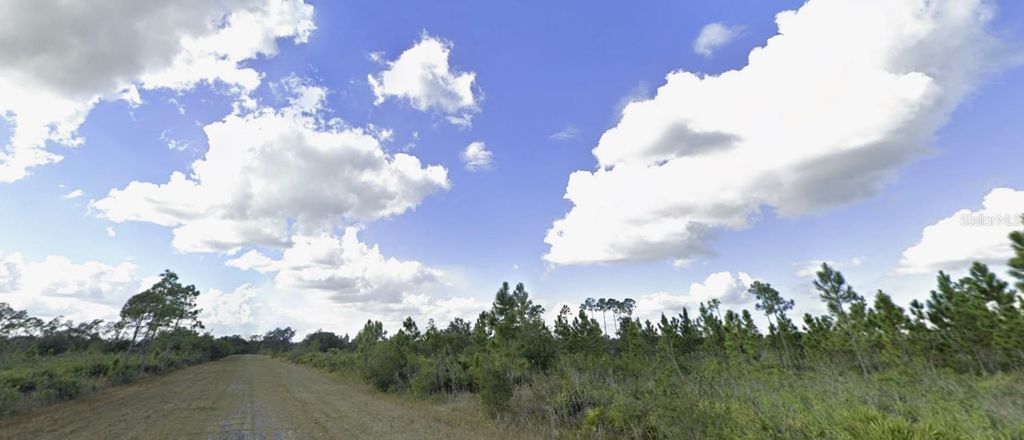 Photo of 1022 Calliandra Drive, Indian Lake Estates, FL 33855 (MLS # P4937416)