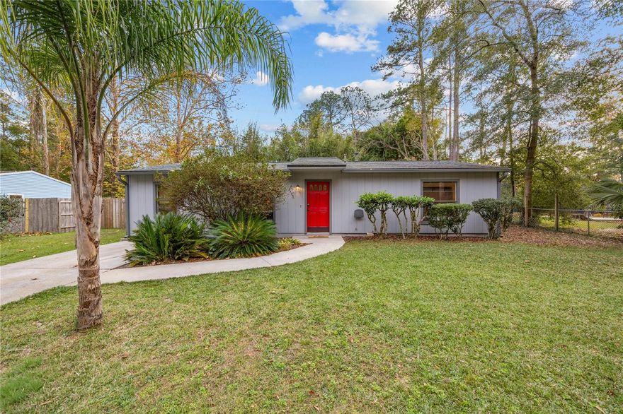 Tucked away in the highly desirable Springtree neighborhood, this beautifully updated 3-bedroom, 2-bathroom home offers the perfect blend of comfort, style, and location. Just 10 minutes from the University of Florida, Shands Hospital, downtown Gainesville, and multiple shopping centers, you’ll enjoy everyday convenience while still feeling tucked away in a quiet, established community.

Step inside to be welcomed by a bright and inviting interior with updated bathrooms, an updated kitchen, and a thoughtfully designed third bedroom, setting this home apart from many others in the neighborhood. Warm LVP flooring and abundant natural light create an easy flow between the living, dining, and kitchen areas, making the home both functional and welcoming.

The true heart of this property is the show-stopping backyard. Designed for connection, relaxation, and entertaining, this home features a large covered back patio—perfect for hosting gatherings, outdoor dining, or relaxing evenings with friends and family. The fully fenced, beautifully landscaped backyard includes raised garden beds for the green thumb, plus two storage sheds—one powered and attached to a covered workbench, ideal for hobbies and projects.

Offering a newer 2021 roof, versatile indoor spaces, and exceptional outdoor living, this home stands out as a rare opportunity in the Springtree neighborhood. From the updated interior to the expansive backyard, this home seamlessly combines function, charm, and location—inviting you to slow down, settle in, and truly make it your own. A place you’ll look forward to coming home to each day. Schedule your private showing and experience this Springtree oasis for yourself.