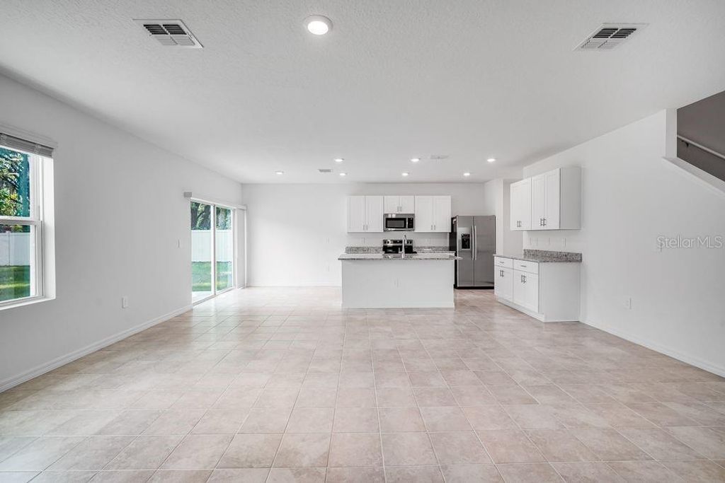 Photo of 13230 Tropical Breeze Way, Hudson, FL 34669 (MLS # TB8421413)
