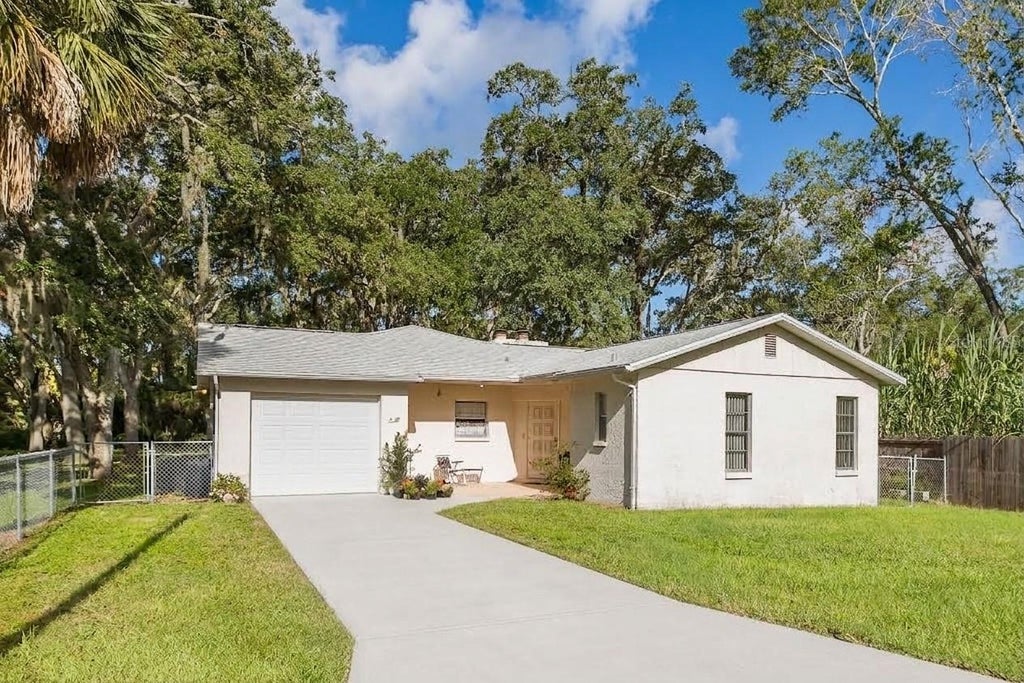 Photo of 4715 Needle Palm Drive, New Port Richey, FL 34652 (MLS # TB8546195)