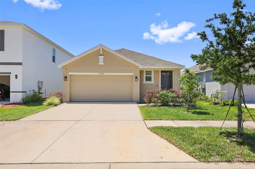 Welcome to effortless Florida living in the highly sought-after Northwater community! Built in 2023, this like-new 3-bedroom, 2-bathroom ranch offers modern design, thoughtful upgrades, and a functional split floor plan—all in pristine condition.Step inside to an open-concept layout filled with natural light and a clean, neutral palette that makes it easy to personalize. The main living areas feature durable tile flooring throughout, seamlessly connecting the spacious living room, formal dining area, and beautifully appointed kitchen. The kitchen is designed to impress with white shaker cabinetry, granite countertops, a custom tile backsplash, stainless steel appliances, a gas range with proper ventilation, and ample prep space for everyday living or entertaining. The private primary suite is tucked away on one side of the home, offering peaceful backyard views, a walk-in closet, and a well-appointed ensuite bath featuring a tiled walk-in shower with glass enclosure. Two additional bedrooms are positioned on the opposite side, providing privacy and flexibility for guests, family, or a home office. A dedicated laundry room and two-car garage add convenience. Enjoy Florida’s indoor-outdoor lifestyle with sliding glass doors leading to a screened-in porch, perfect for relaxing or entertaining. The fully fenced, deep backyard offers plenty of space to create your own outdoor oasis. Additional features include a water softener system, upgraded finishes throughout, and a truly move-in-ready condition that feels just like new construction—without the wait. Residents of Northwater enjoy access to resort-style amenities, including a clubhouse, pool, fire pit, and recreation areas. This home combines modern comfort, quality upgrades, and a prime community setting—ready for its next owner to move right in and make it their own.