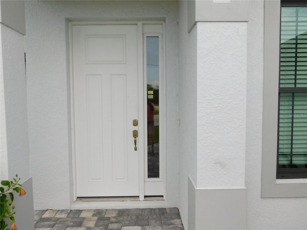 Photo of 101 Wayne Road, Rotonda West, FL 33947 (MLS # W7877387)