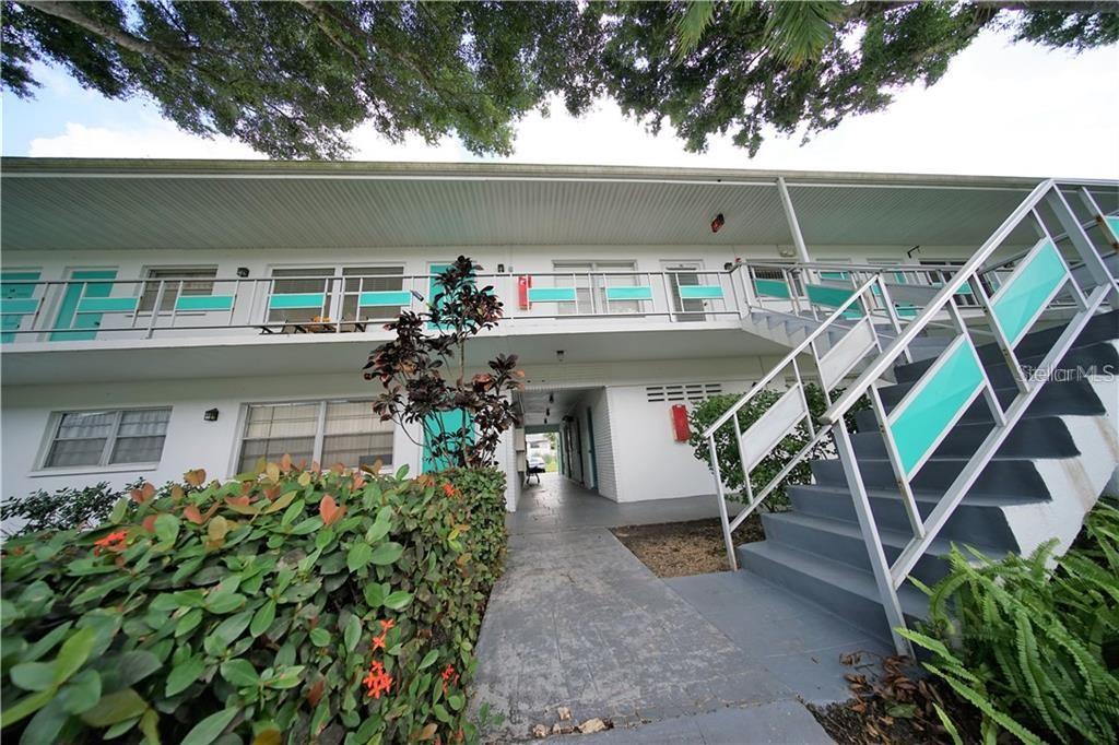 Welcome to the Town Apts community, located in X zone, which is presently NOT A FLOOD ZONE. This unit tucked in the west END OF THE COMPLEX, on the second floor, 2nd from the mid stairway features UPDATED kitchen cabinets, FLORIDA ROOM in the back, gas stove, laminate and ceramic tile flooring, CARPORT, and more. The room sizes are approximate, and Florida room might be additional square footage not reflecting in total square footage in the public records; buyer is advised to measure all and verify. The LOW MONTHLY FEE in the amount of $430 includes presently water/sewer, trash removal, basic CABLE, INTERNET, maintenance of the common grounds, GAS for
cooking & heating, & insurance of the building exterior while buyer is advised to obtain insurance for the unit’s interior, windows, doors, and AC. This building has a laundry facility room, storage room, and a water-heater supplying hot water to multiple units. Town Apts complex is located approximately 1.5 miles from Sawgrass Park and approximately 7 miles from each Gandy Beach and St. Petersburg Downtown offers SWIMMING POOL, shuffleboard, and a clubhouse with pool-table room and a library.