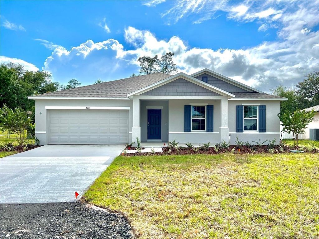 Photo of 560 Walnut Avenue, Orange City, FL 32763 (MLS # O6370198)
