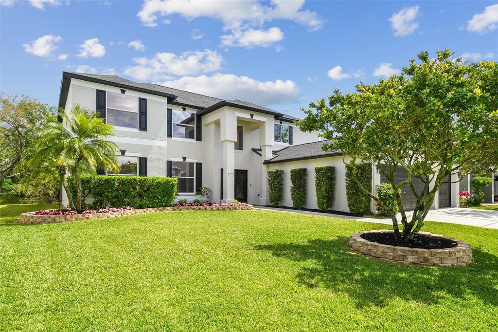 Photo of 16323 Muirfield Drive, Odessa, FL 33556 (MLS # TB8364900)