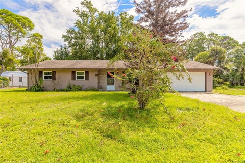 Photo of 2629 Umbrella Tree Drive, Edgewater, FL 32141 (MLS # NS1089158)