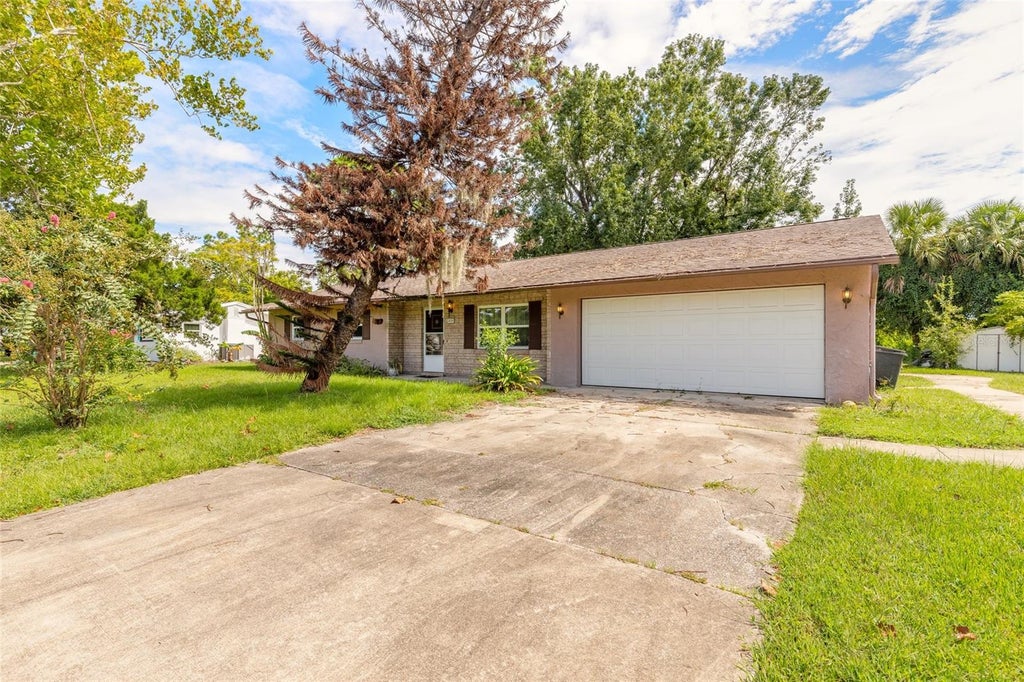 Photo of 2629 Umbrella Tree Drive, Edgewater, FL 32141 (MLS # NS1089158)