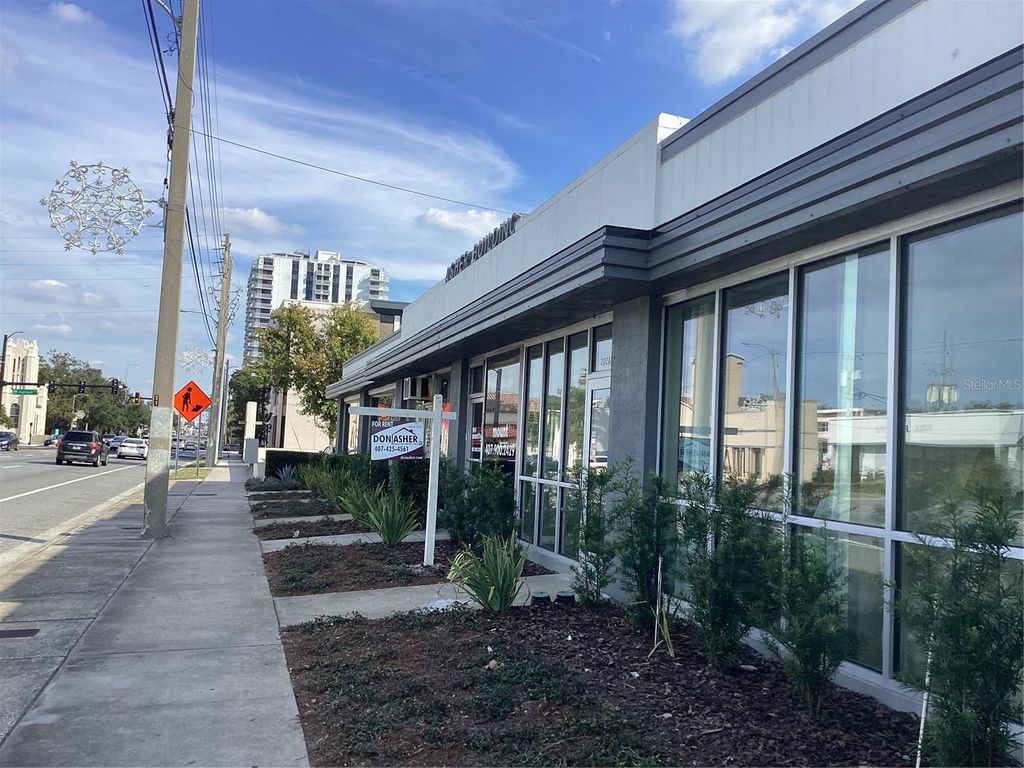 Photo of 202 E Colonial Drive, Orlando, FL 32801 (MLS # O6363034)