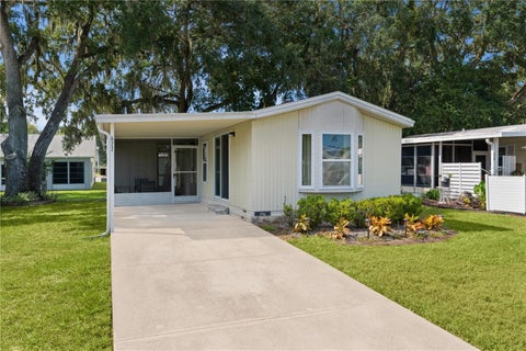 Photo of 622 Cottage Park Lane, Leesburg, FL 34748 (MLS # OM733286)
