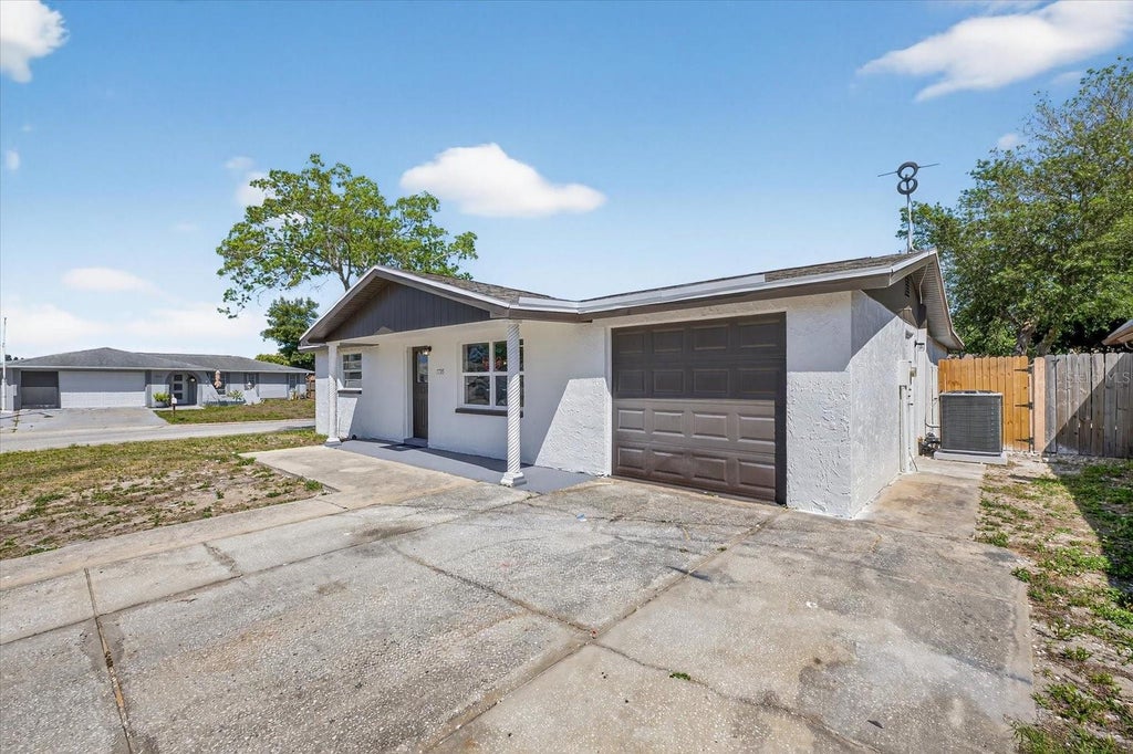Photo of 7735 Brookridge Drive, Port Richey, FL 34668 (MLS # O6413475)