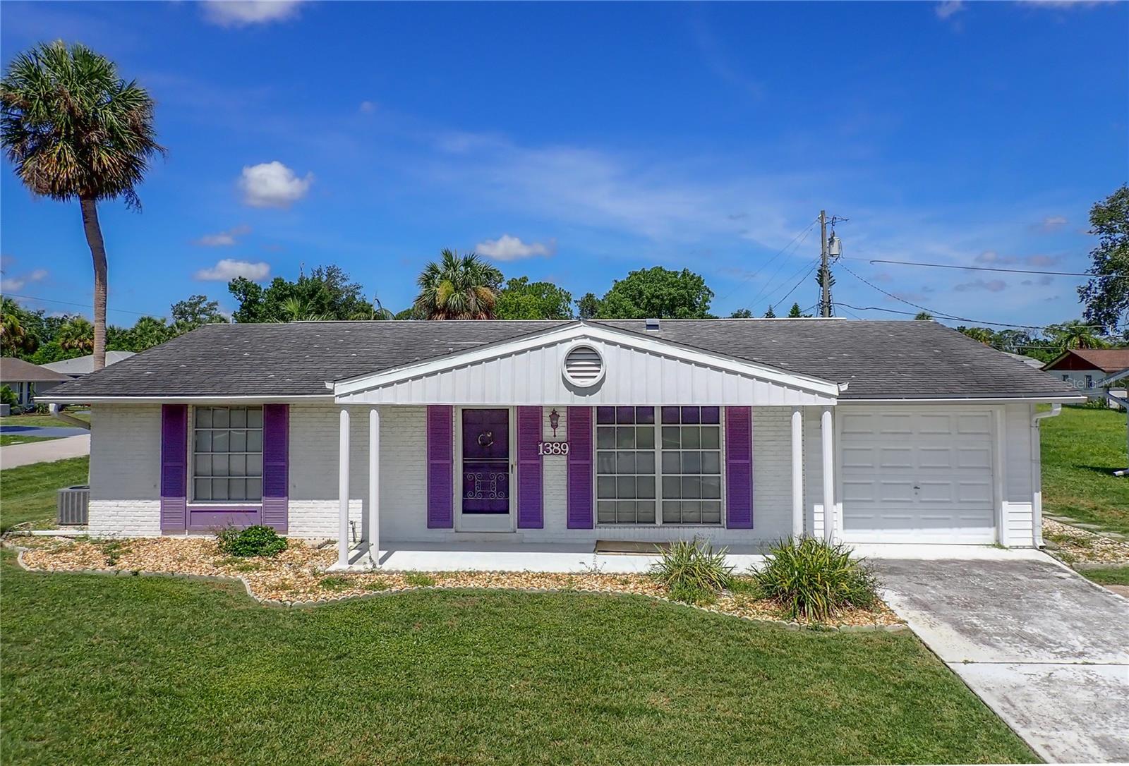 PLEASE SEE THE 3D INTERACTIVE TOUR! Opportunity Awaits: Transform This Port Charlotte Fixer-Upper! Discover the potential in this charming 2-bedroom, 2-bathroom home, perfectly situated on a corner lot with county water in the heart of Port Charlotte, Florida. With 931 square feet of living space and solid block construction, this property is a true fixer-upper with incredible possibilities – whether you're dreaming of a personalized home or a lucrative income-producing property. Compact & Functional Layout: This home features a comfortable living room, with a dining space conveniently located just off the kitchen. Two Full Baths: The primary bedroom boasts a private en-suite bathroom with a shower/tub combo. A second full guest bathroom, also with a shower/tub, serves the additional bedroom and guests. Expansive Lanai: Enjoy the Florida lifestyle on the 13' x 27' lanai, providing ample space for outdoor living. This versatile area also includes a dedicated storage/laundry room, adding practical convenience. One-Car Garage: A dedicated one-car garage provides secure parking and additional storage. Convenient Access: Just moments away from a wide array of shopping and dining options, ensuring all your daily needs and entertainment desires are easily met. Don't miss this chance to bring your vision to life in a fantastic Port Charlotte location. This property is waiting for your personal touch!