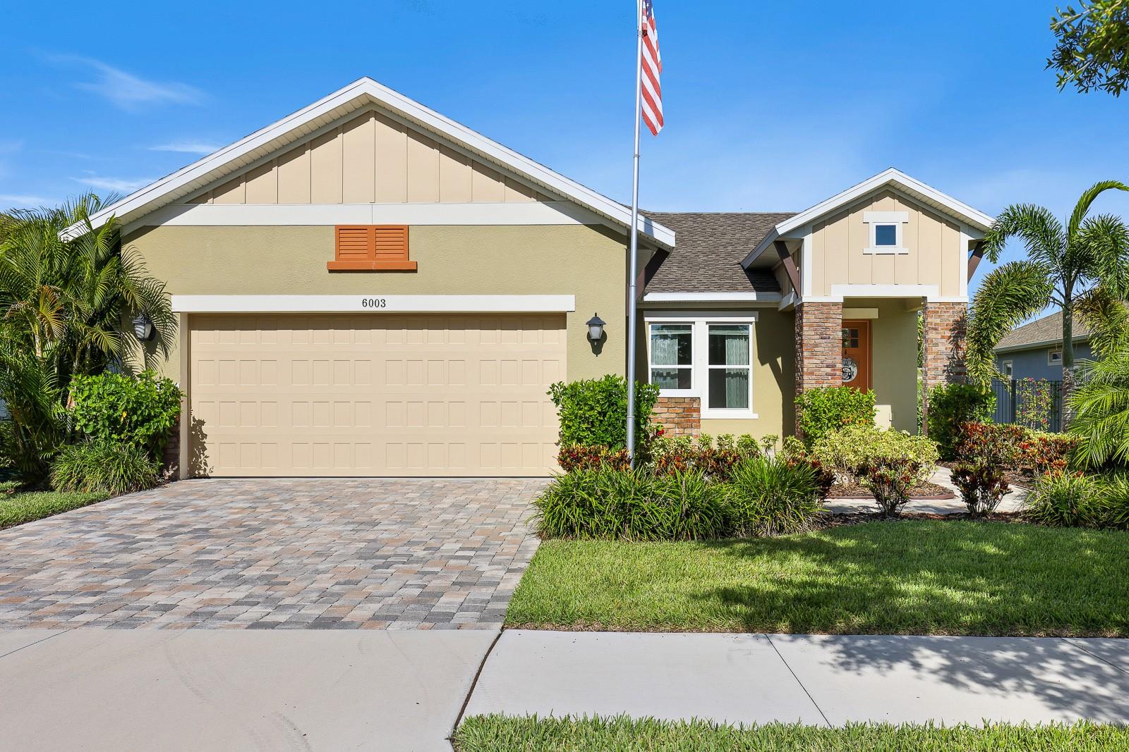 Situated in the highly desirable 55+ community of Encore at Fishhawk Ranch, this exceptional Legend model by David Weekley Homes combines thoughtful design, beautiful finishes, and a prime location. Directly across the street from the state-of-the-art Oasis Club, you’ll have quick and easy access to first-class amenities, including pickleball and shuffleboard courts, a sparkling pool, relaxing hot tub, and numerous social spaces—perfect for staying active and connected without ever having to travel far. Added conveniences like a side gate entry and extra parking make this location even more appealing.
From the moment you arrive, the pavered walkway, spacious front patio, and lush landscaping set the tone for the warm and inviting atmosphere inside. The open concept floor plan offers seamless flow between the main living areas, highlighted by beautiful laminate flooring, an abundance of natural light, and a comfortable, welcoming feel. The kitchen is a true centerpiece—featuring a large island with space for seating and a deep sink, wall oven and microwave, cooktop, dishwasher, refrigerator, large pantry closet, and thoughtful touches like pull-out racks in the lower cabinets for easy storage. The dining room is perfectly positioned for entertaining, while the living room offers a cozy yet spacious retreat with surround sound, TV, DVD player, and audio equipment that remain with the home.
The home’s split bedroom layout ensures privacy for all. A generous third bedroom features its own ensuite bath with a glass-enclosed shower—ideal for guests and a second bedroom that has access to the second full bathroom. The primary suite, located at the back of the home, is a peaceful retreat with an oversized walk-in shower, dual sink vanity, and an expansive walk-in closet. Additional spaces include an office/den with elegant glass French doors and a laundry room with ceramic tile flooring, a folding station and utility sink.
Step outside through large glass sliders to the screened lanai, where you can relax and enjoy the fully fenced backyard, complete with mature, well-maintained landscaping in both the front and back yards. The 2-car garage provides plenty of storage, and the home also comes equipped with a water softener, washer and dryer, and TVs in both the living room and primary bedroom. Professionally installed drapes in the living room, along with window treatments in the primary bedroom and office, will convey with the sale. Select pieces of furniture are also available for purchase separately, making this home truly move-in ready. This property offers the perfect blend of comfort, style, and resort-style living in one of the area’s most sought-after communities.