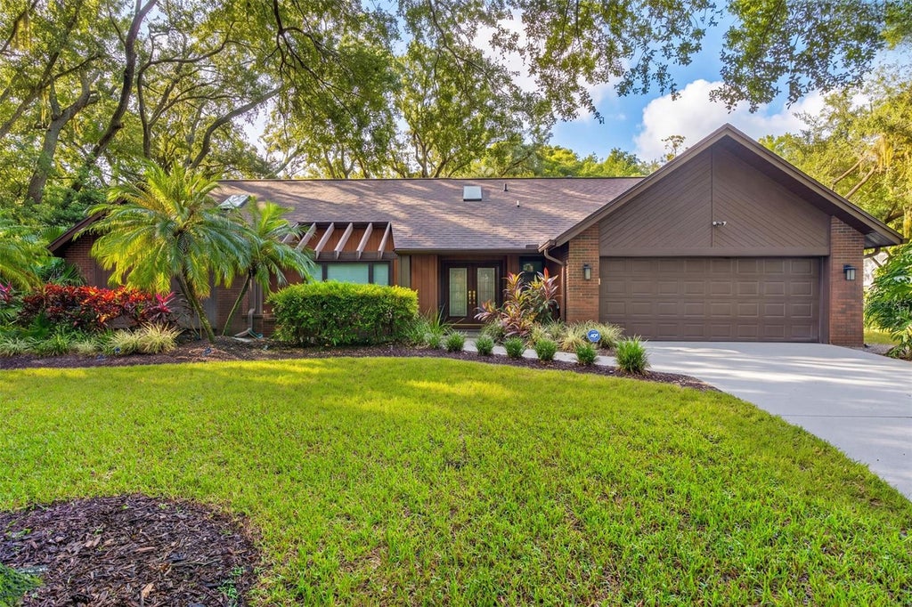 Photo of 3300 Meadow View Lane, Palm Harbor, FL 34683 (MLS # TB8555221)