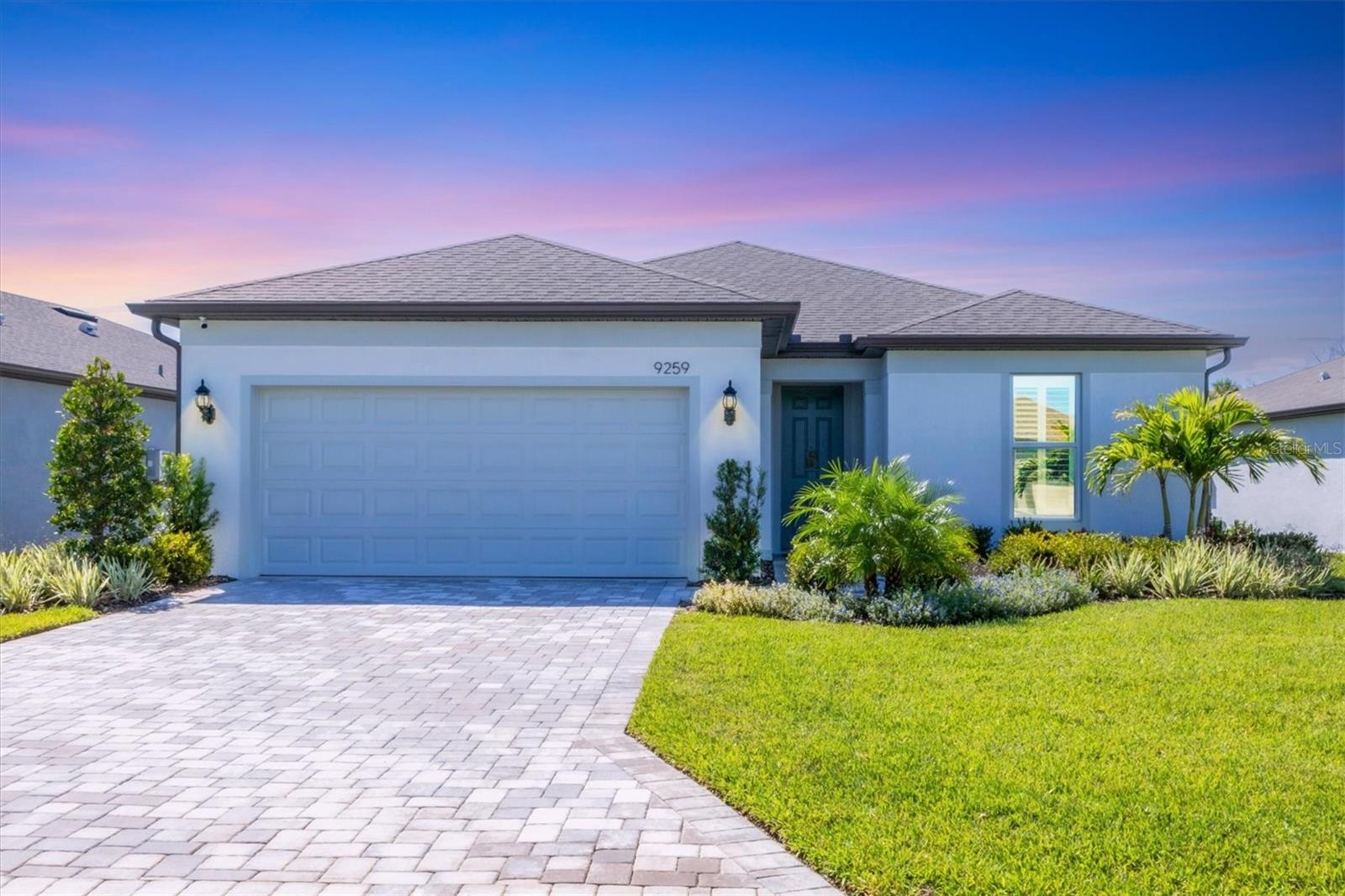 Enjoy unbelievable water and preserve views from this one-story home with 3 bedrooms, a versatile den/office, 2 bathrooms and an extended, screened-in lanai in the guard-gated Del Webb Bayview – a popular 55+ community with lots of activities and amenities. This Mystique floor plan has an open kitchen with a center island that overlooks a bright gathering room, perfect for entertaining and everyday living. The kitchen has lots of upgrades including the gourmet kitchen package with top-of-the-line cabinetry, 5-burner gas cooktop with stainless steel hood, built-in oven and microwave, stainless steel fridge, extra deep stainless-steel sink with reverse osmosis faucet and beautiful quartz counter tops. The kitchen flows effortlessly into the dining room which has a sliding door with an electric, remote-controlled shade that leads to the lanai. Wood-look tile runs throughout the home – no carpet to deal with – and the 8-foot solid wood doors were upgraded with a designer finish! And, the home is equipped with IMPACT GLASS WINDOWS AND DOORS for peace of mind and plantation shutters throughout!! The owner’s suite is a private oasis with windows that overlook the stunning water views, large walk-in closet and an en-suite bathroom with a double vanity with quartz countertops and square sinks, oversized shower with niche and space for a make-up station or more storage. The other two bedrooms are in the front of the home which provides privacy for your guests. The den/office has double doors and is the perfect space to work or retreat after a day in the sun. The two-car garage has a 4-foot extension so you can fit all your gear or golf cart! The laundry room has a utility sink and plenty of room for storage! You’ll be able to soak up the Florida sun or watch the wildlife from your covered and screen-in lanai with gas pre-plumbing for your outdoor kitchen and grill. There is also plenty of room in the backyard for a private pool. This home is only a year old and has so many upgrades that the builder is not offering including WHOLE HOUSE WATER FILTRATION SYSTEM, WATER SOFTNER, TANKLESS HOT WATER HEATER, REVERSE OSMOSIS FAUCET and TRANSFERRABLE ROOF WARRANTY. Located a short stroll from the resort-style amenity center, access to the endless activities and social events is year-round. Living in Del Webb Bayview means enjoying an active 55+ lifestyle with a resort-style pool, state-of-the-art fitness center, pickleball and tennis courts, vibrant clubhouse, activities director, dog park, community garden, walking trails, restaurant/bar and more. Located within easy reach of St. Petersburg, Tampa, and Sarasota, you’re never far from award-winning dining, shopping, and world-famous Gulf Coast beaches and international airports. Come live the Florida lifestyle today!!