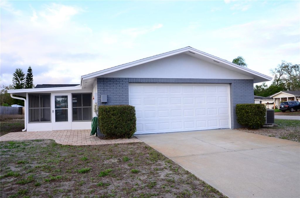 Photo of 10433 Laburnum Drive, Port Richey, FL 34668 (MLS # TB8486832)