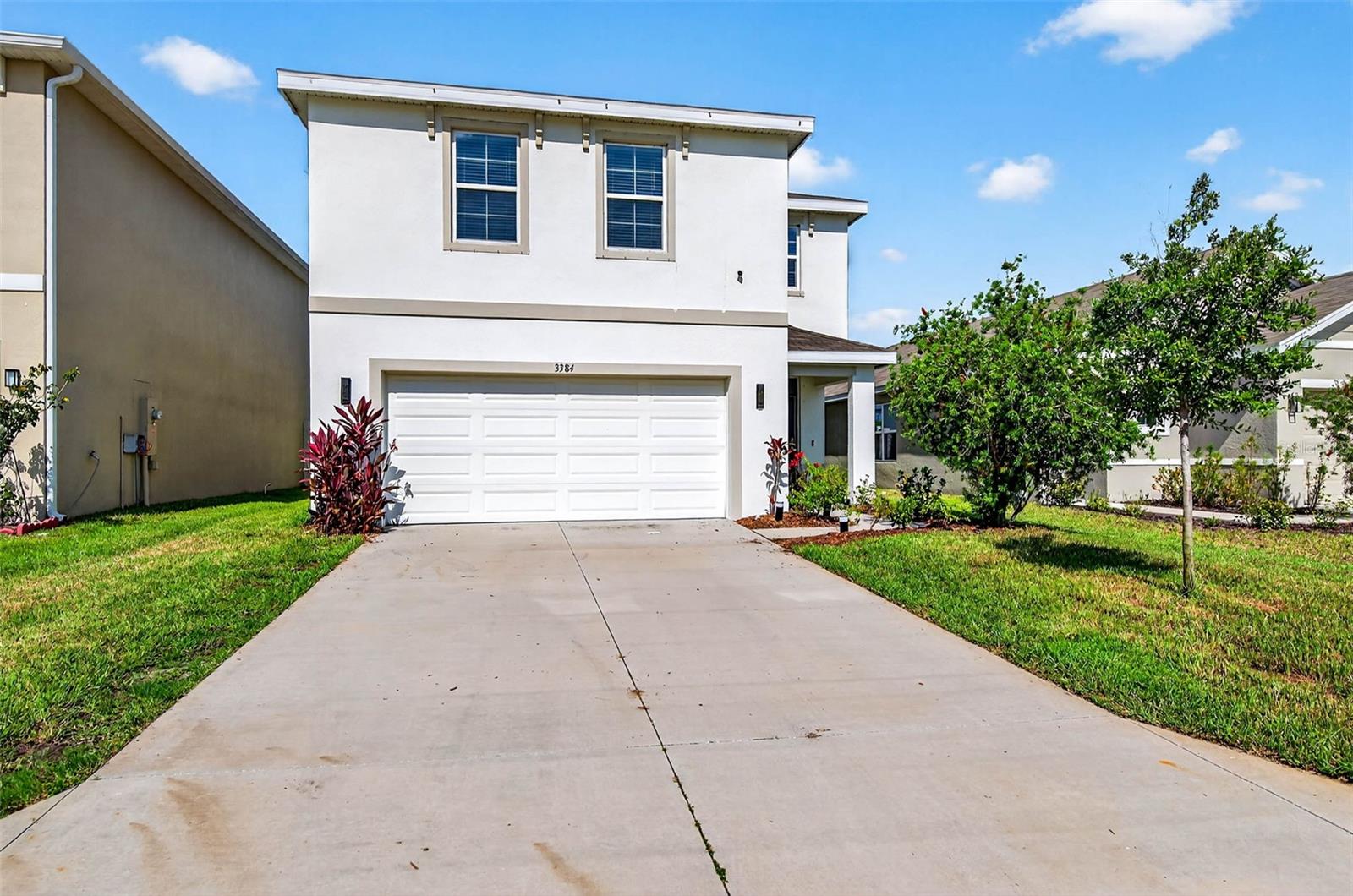 Experience elevated living in this beautifully updated 4-bedroom, 2.5-bathroom home with a 2-car garage and EV charger, located in the desirable Preserve community. From the moment you arrive, you’ll notice the home’s pristine condition and thoughtful upgrades throughout. Designed with comfort and functionality in mind, this open-concept floor plan blends modern style with everyday practicality. Inside, you’ll find upgraded ceramic tile floors, contemporary lighting, wood blinds, ceiling fans, soaring ceilings, and an abundance of natural light. The main floor features a spacious living area and a chef-inspired kitchen with solid wood cabinetry, granite countertops, stainless steel appliances, an oversized sink and faucet, large pantry, tile backsplash, and an expansive island perfect for gathering and entertaining. A convenient half bath is located on the main level. Upstairs offers three generously sized guest bedrooms—all with wood-look ceramic tile (no carpet!) and custom wood accent walls—a full laundry room, and a spacious primary suite. The primary bedroom includes a walk-in closet with custom shelving, dual-sink vanity, private water closet, and an updated fully tiled walk-in shower. Step outside to your own backyard retreat complete with a covered patio, artificial turf, propane fire pit, and lush, low-maintenance landscaping—ideal for enjoying Florida’s year-round sunshine. As a resident of The Preserve, you'll enjoy access to top-tier amenities including a resort-style zero-entry pool, lap pool, fitness center, clubhouse, dog park, playgrounds, basketball courts, and athletic fields. The location is unbeatable—just minutes from the Veterans Expressway, top-rated schools, shopping at Citrus Park Mall, TPC Golf Course, Starkey Wilderness Preserve, and direct access to the Suncoast Trail. Pets are welcome with a $250 non-refundable pet fee. Tenant responsible for electric, water, and sewer. Washer and dryer are included, and full access to all community amenities is provided. This move-in ready home has it all—schedule your private tour today!