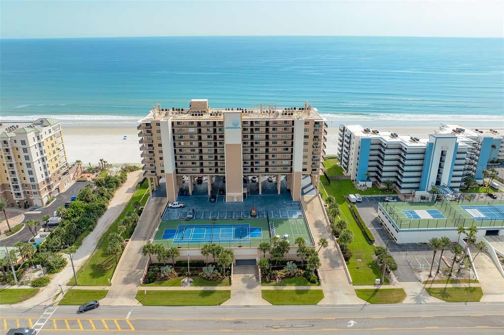 Photo of 4139 S Atlantic Avenue #A103, New Smyrna Beach, FL 32169 (MLS # O6435864)