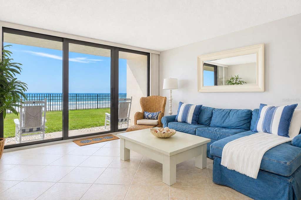 Photo of 4139 S Atlantic Avenue #A103, New Smyrna Beach, FL 32169 (MLS # O6435864)