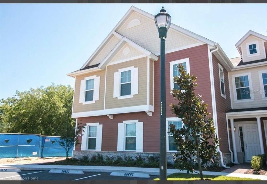 Experience unparalleled luxury in this exquisite townhome, offering four generously-sized bedrooms, each paired with its own ensuite bathroom, plus an additional powder room for guests. Every detail of this home speaks of sophistication — from the elegant granite countertops to the premium-grade carpeting. Step inside to a tastefully decorated space, fully furnished and ready to welcome you or your guests. Embrace the modern conveniences with energy-efficient tankless water heaters and top-of-the-line natural gas appliances. Indulge in private moments or intimate gatherings on the secluded patio, which promises serene conservation views. The home’s open floor plan seamlessly blends luxury with functionality, catering to contemporary lifestyles. Nestled in the coveted Summerville resort, the property enjoys a prime location. It's just a stone's throw away from premier shopping destinations, renowned theme parks, and a myriad of dining options. With short-term rental zoning, this residence presents an excellent investment opportunity. Private patio with BBQ grill and summer kitchen. Currently, it not only stands in impeccable condition but is also actively rented, with multiple bookings already secured for the near future.  Summer Kitchen and Hot Tub included.