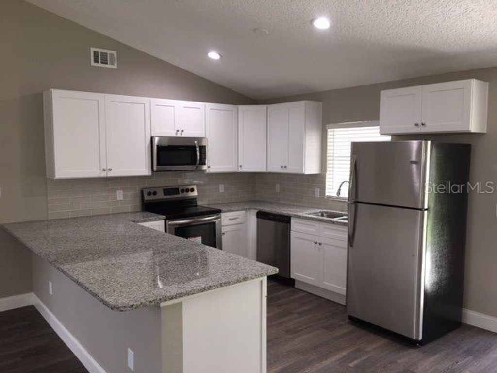 Photo of 7919 Goldleaf Street, Orlando, FL 32835 (MLS # O6387830)