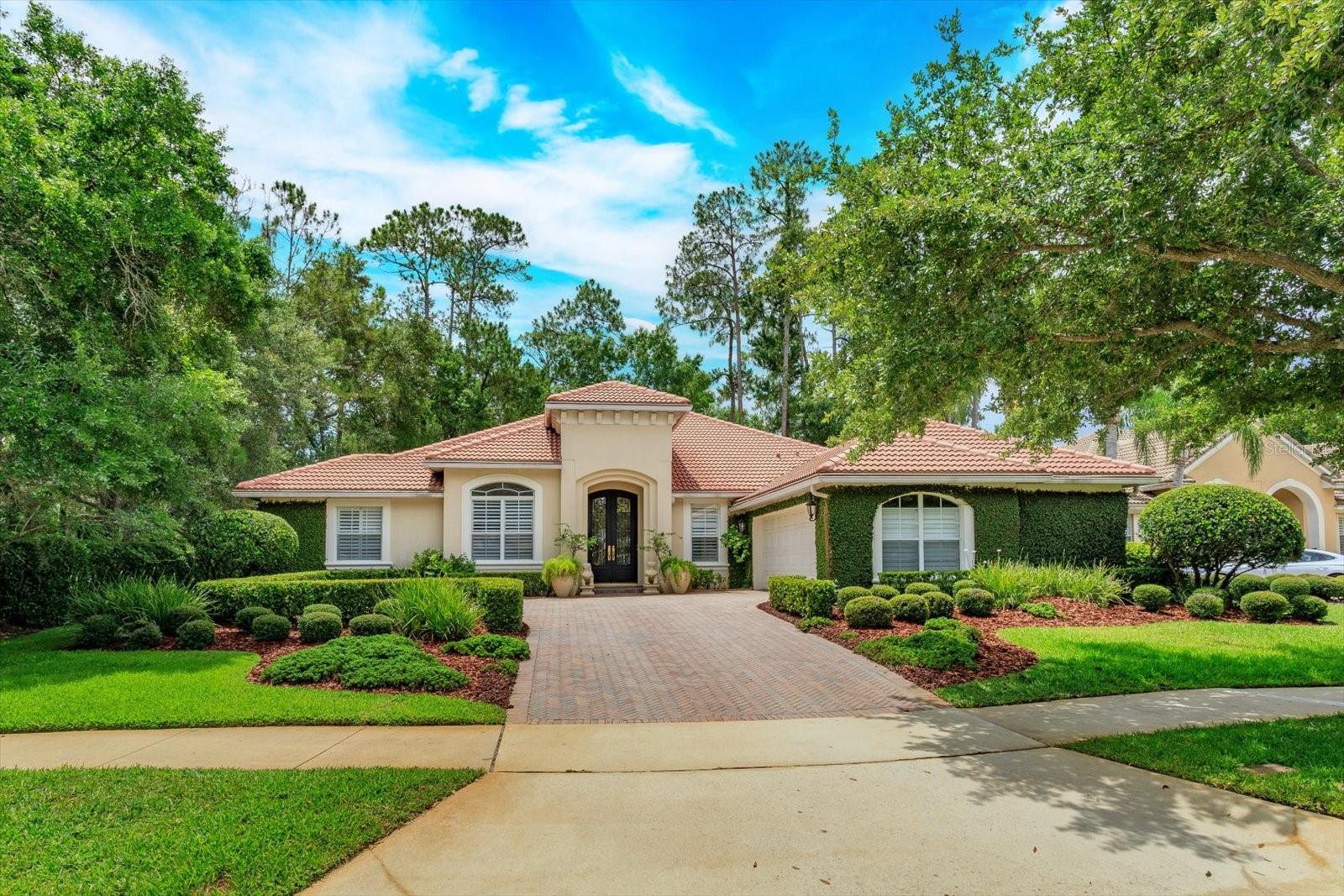 Timeless Elegance Meets Modern Luxury in the sought after guard gated community of Alaqua Lakes.Step through custom iron entry doors into a light-filled, upscale home where elegance is evident in every detail. Luxurious travertine marble flooring graces the main living areas, complemented by rich Brazilian rosewood floors in the office and two bedrooms—completely carpet-free for a clean, upscale finish.
The chef-inspired kitchen is a standout, featuring a professional-grade French La Cornue gas range with double ovens (one gas, one electric), a custom limestone hood, Sub-Zero refrigerators, and striking limestone countertops. Whether you're hosting a dinner party or simply boiling water, this kitchen impresses.Retreat to the expansive primary suite with a spa-like bath that includes a freestanding porcelain tub, top-tier designer fixtures, and a shower with integrated jets for the ultimate in relaxation.French doors in the living room open to a screened-in backyard oasis, finished with travertine pavers—perfect for outdoor living and entertaining.Additional features include:- Wood plantation shutters throughout most of the home - Energy-efficient double-pane windows - Newer top-of-the-line Trane HVAC systems Newer Rinnai tankless gas water heater - Whole-house natural gas powered backup generator - Lightning protection system on the roof
- Water filtration system.Residents of this prestigious community enjoy world-class amenities including a resort-style community pool, tennis courts, a 7-acre park, open-air pavilion, and a multi-purpose sports field.
"""