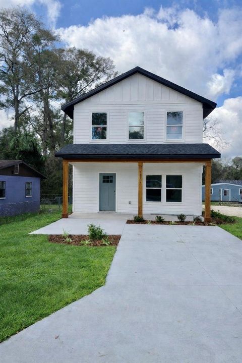 Photo of 15214 NW 133rd Terrace, Alachua, FL 32615 (MLS # GC538225)