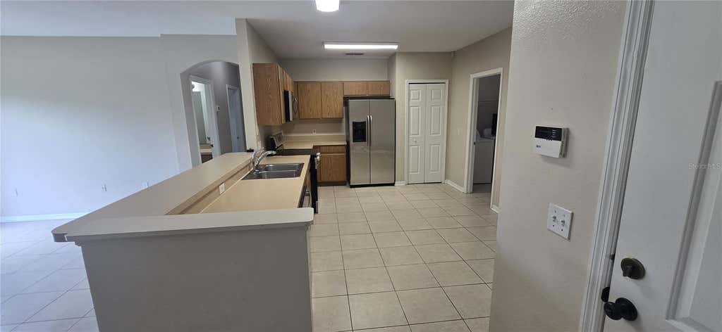 Photo of 911 Gloucester Court, Kissimmee, FL 34758 (MLS # S5154618)