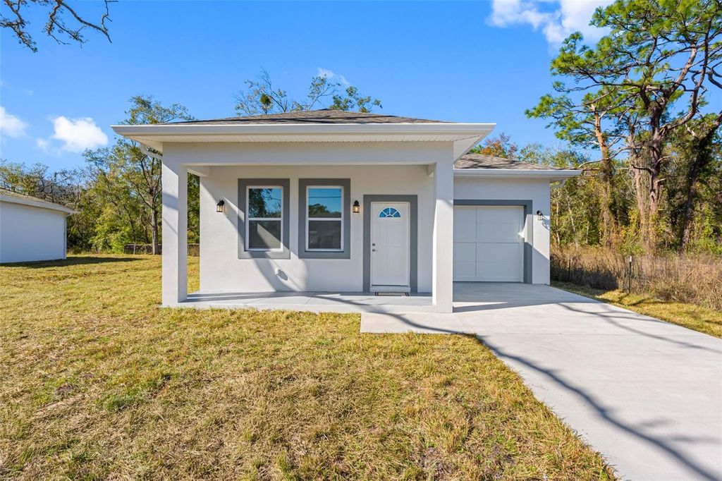 Photo of 10271 Lake Drive, New Port Richey, FL 34654 (MLS # TB8458832)
