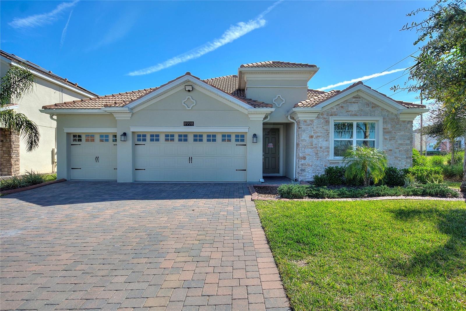 *Golf club membership and Tennis included plus use of Oasis club , Retreat Water park and Plaza residents only pools, gym , pickel ball courts ,grill and bar with $75 monthly food credit included*The HOA also covers yard maintenance, TV,home phone, high speed internet & cable via Spectrum.Stand out home that must be seen ,this vibrant Newcastle model has open sight lines with 4 bedrooms ( two with ensuite bathrooms), 3 bathrooms in total ,a bonus room and a 3 car garage. The impressive kitchen comes with a family friendly breakfast nook plus a lovely island that overlooks a combined family, dining & living room. The owner bedroom has a grand walk-in shower with his and her sinks and sliding door to the pool area.Additionally the lot is situated at the end of a Culd de sac.Home has been significantly improved by current owners with addition of large sport pool, spa and outdoor kitchen and bar.Covered lanai offering over 1300 sq ft of covered area with conservation view to rear.Addition of a bonus room ( currently used as an office but could easily be a 5th bedroom).Feature stone wall in lounge with matching stone under kitchen island.Completely re modeled bathroom including walk in shower and large over sized modern Italian tile.The home also has crown moulding to ground floor living areas and master bedroom ,plus waynes coating to the impressive entrance hallway.To the exterior the present owner has undertaken landscaping and decorative edging to the entire exterior of the property and pool area.A truly outstanding opportunity to buy this one of a kind home.